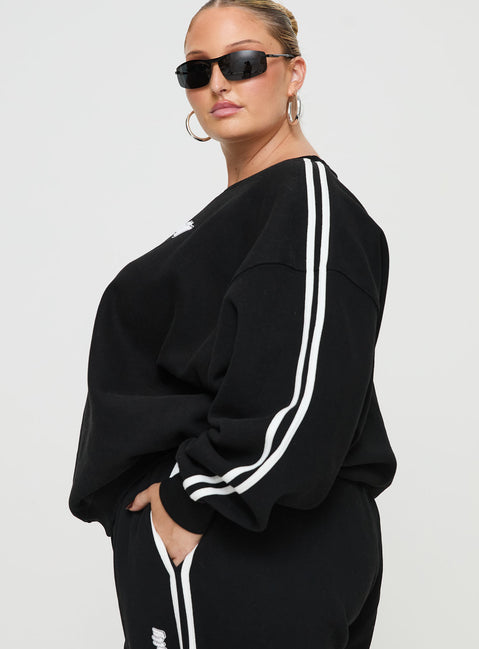 side view of model wearing Princess Polly Princess Polly Crew Neck Sweatshirt Stripe Black / White Curve 