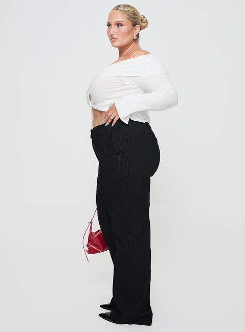 side view of model wearing Princess Polly Jeller Pinstripe Pants Black Curve High Waisted Pants 