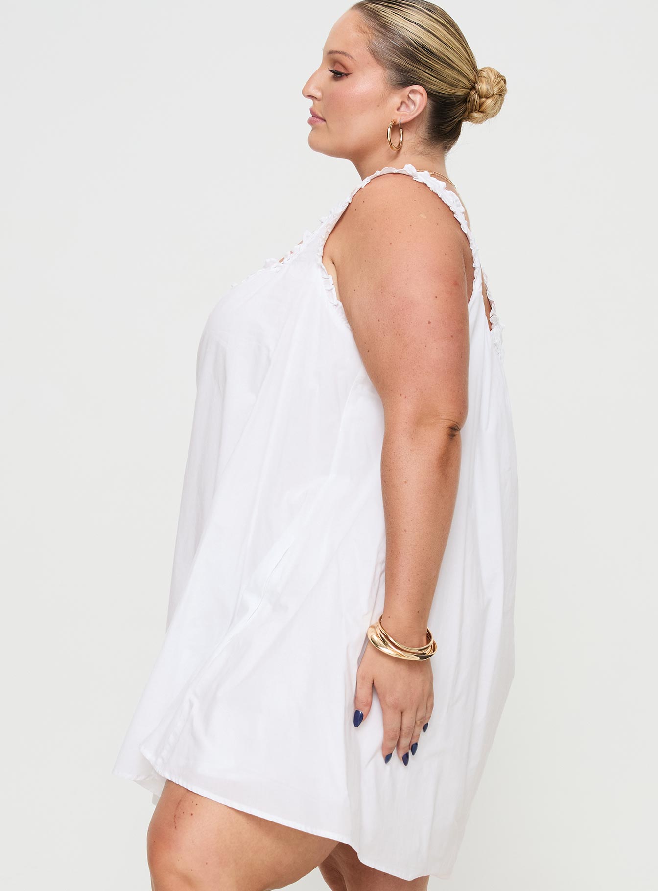 side view of model wearing Princess Polly Swing Mini Dress White Curve Square Neck 