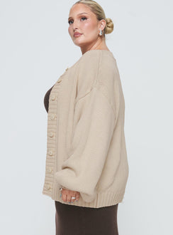 side view of model wearing Princess Polly Edern Cardigan Cream Curve Long 