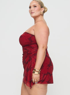 side view of model wearing Princess Polly Donelli Mini Dress Burgundy / Red Floral Curve Straight Neck 