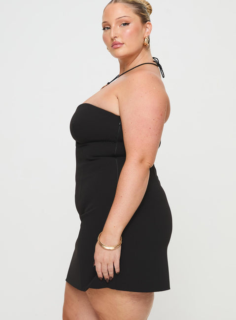 side view of model wearing Princess Polly Simple Sweetheart Mini Dress Black Curve Sweetheart Neckline 