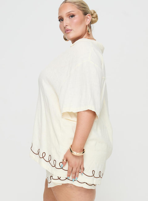 side view of model wearing Princess Polly Jamari Linen Blend Shirt Cream / Brown Curve Three Fourth Sleeves V-Neck 