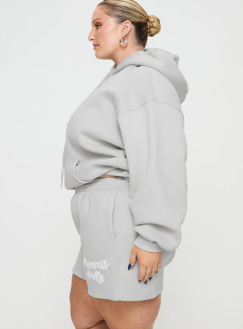 side view of model wearing Princess Polly Princess Polly Track Shorts Puff Text Grey Curve 