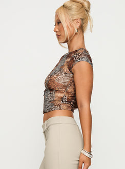 side view of model wearing Princess Polly Tied In Short Sleeve Top Leopard Short Sleeves Crew Neck 