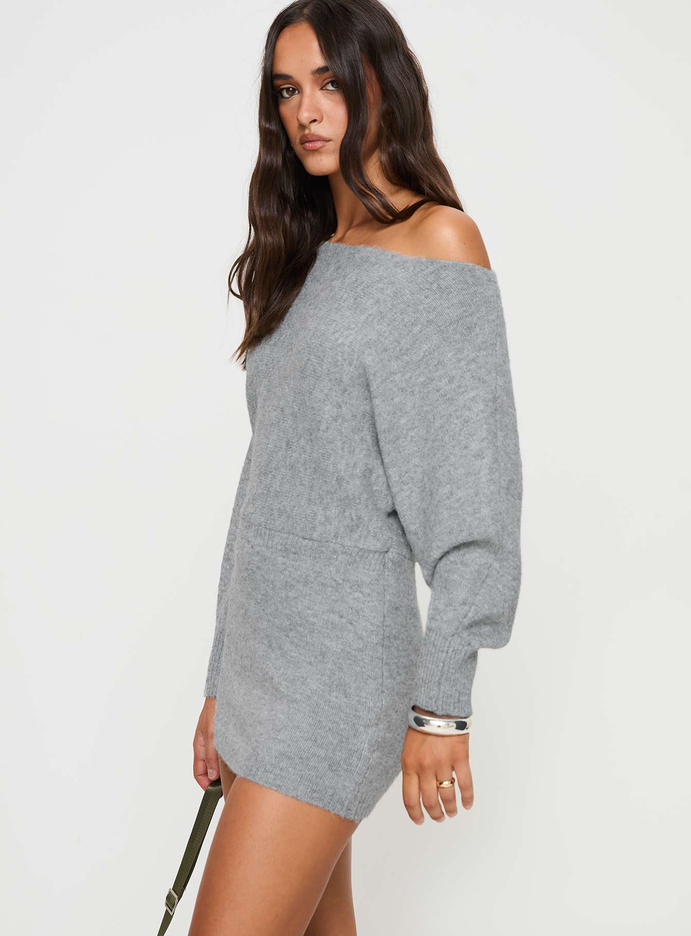 side view of model wearing Princess Polly Peregrine Cold Shoulder Mini Dress Grey Asymmetric Neckline 