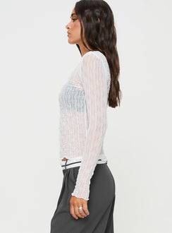side view of model wearing Princess Polly Macgraw Long Sleeve Top White Full Sleeves Crew Neck 