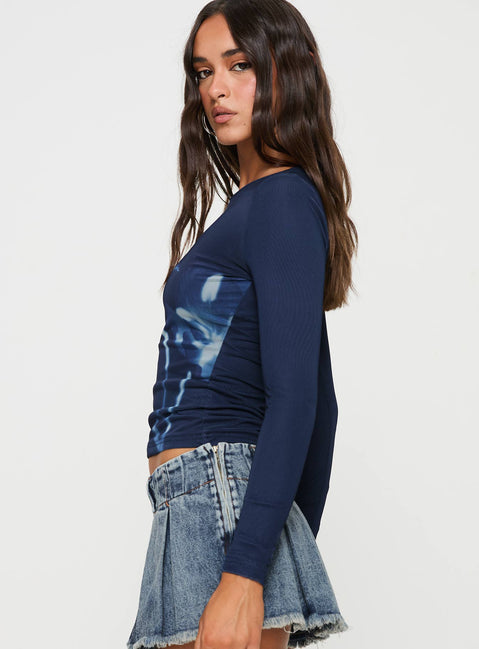 side view of model wearing Princess Polly Raldor Long Sleeve Top Navy Full Sleeves Crew Neck 