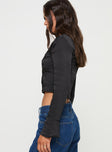 side view of model wearing Princess Polly Watch Me Long Sleeve Top Black Full Sleeves Square Neck 