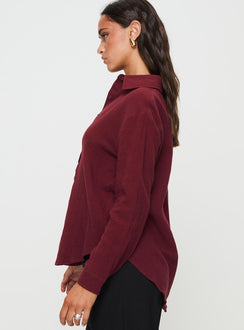 side view of model wearing Princess Polly Mahalia Shirt Burgundy Full Sleeves V-Neck 