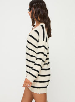 side view of model wearing Princess Polly Forte Sweater Mini Dress Black / Cream V-Neck 