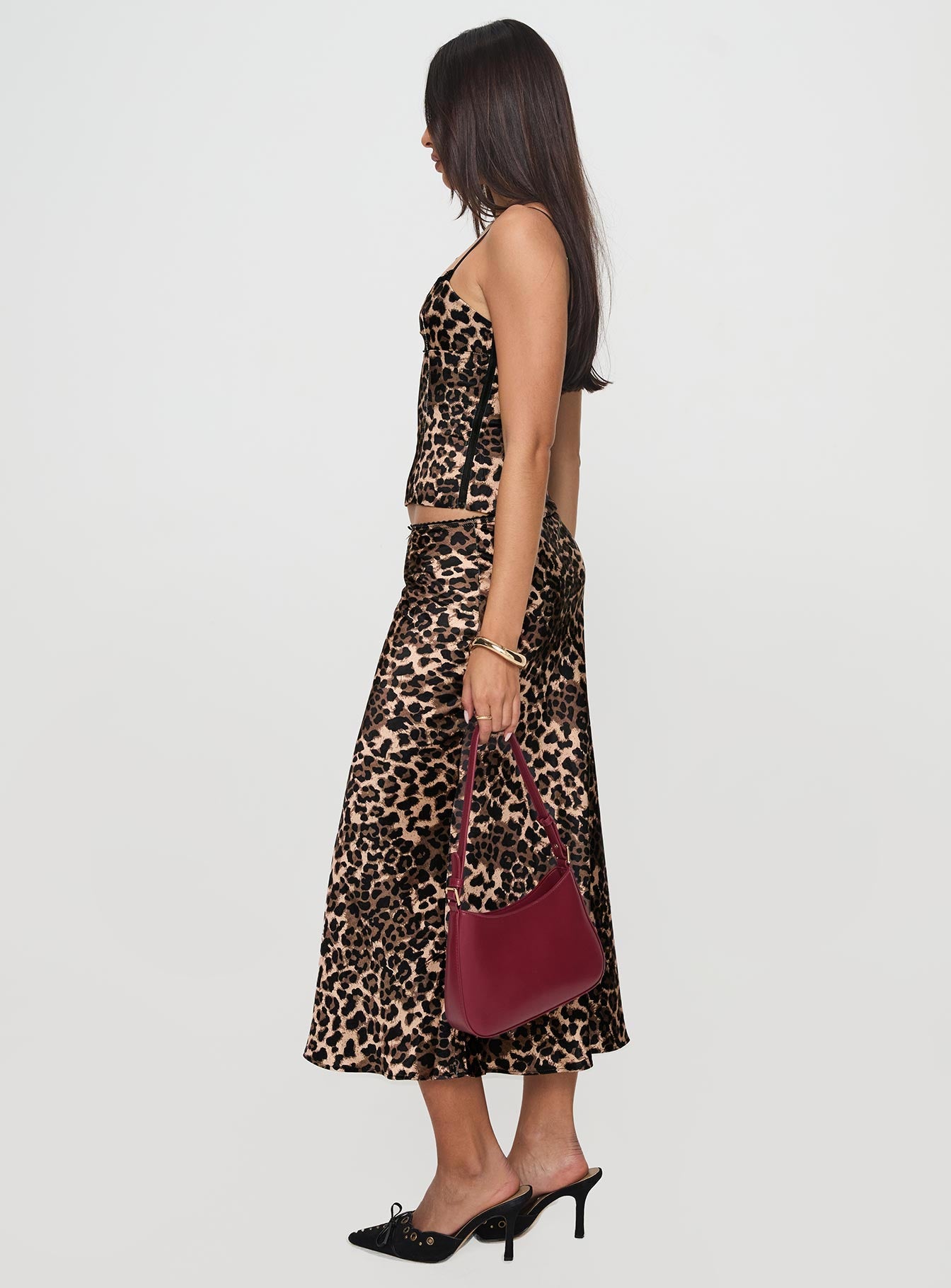   side view of model wearing Princess Polly Enigmatic Maxi Skirt Leopard Maxi 