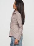 side view of model wearing Princess Polly Run The World Top Brown Stripe Full Sleeves High Neck 