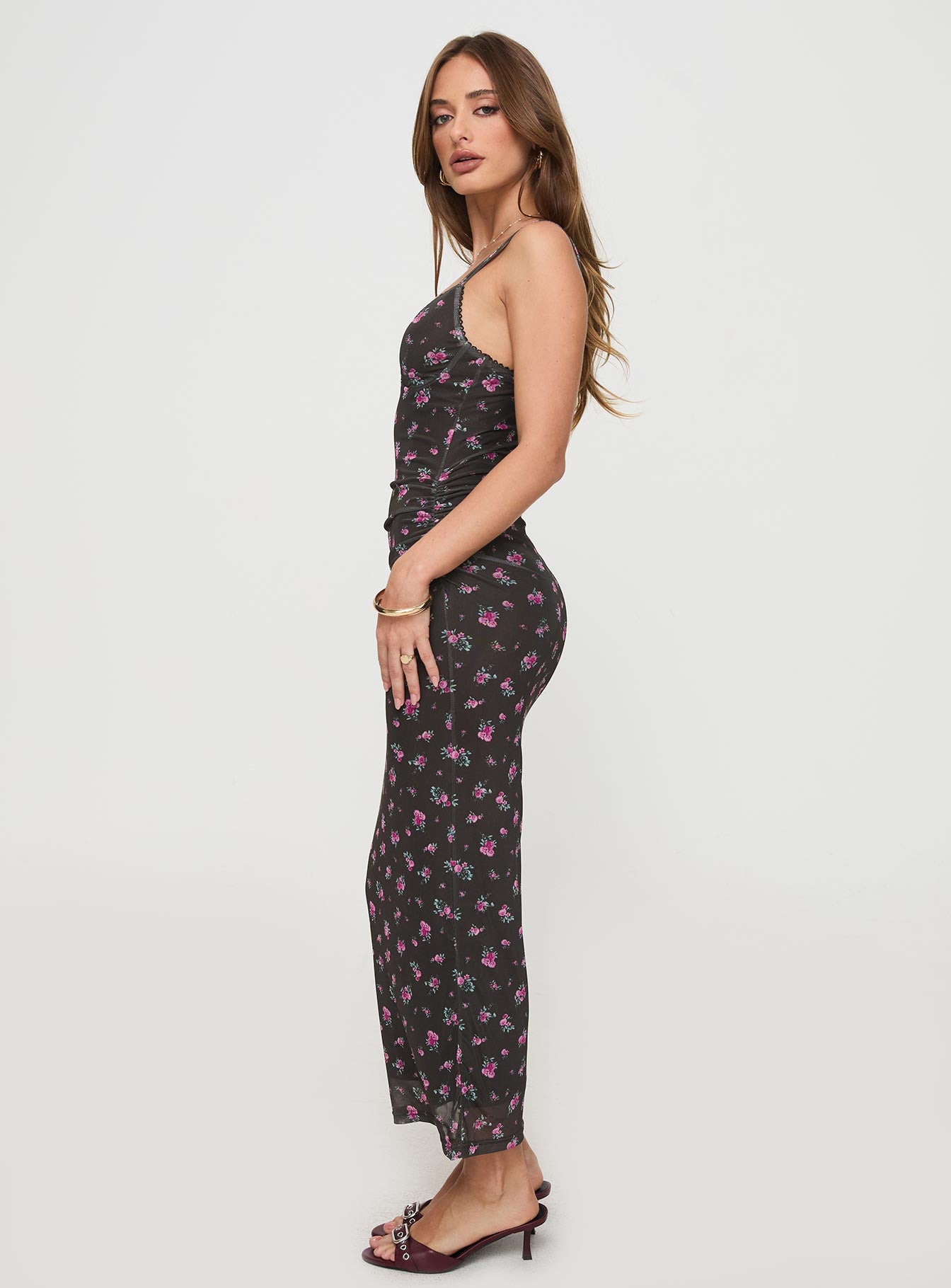 side view of model wearing Princess Polly Cotter Maxi Dress Black Floral V-Neck 