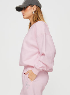 side view of model wearing Princess Polly Princess Polly Crew Neck Sweatshirt Script Baby Pink / Grey 
