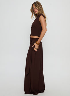   side view of model wearing Princess Polly Full Orbit Shirred Maxi Skirt Chocolate Brown Maxi Skirts 