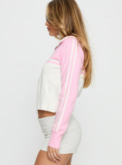 side view of model wearing Princess Polly Take The Lead Zip Through Knit Sweater Pink / White Cropped 