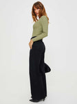 side view of model wearing Princess Polly Maple Flare Jeans Washed Black High Waisted 