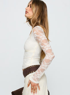 side view of model wearing Princess Polly Pitter Long Sleeve Top Cream Full Sleeves V-Neck 