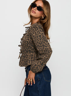 side view of model wearing Princess Polly Recognize Tie Detail Long Sleeve Top Leopard Full Sleeves Crew Neck 