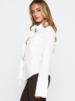 side view of model wearing Princess Polly The Temptation Long Sleeve Top White Full Sleeves High Neck 