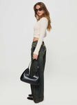 side view of model wearing Princess Polly Ribbon Stamp Wide Leg Jeans Antique Wash Petite Low Rise Jeans 