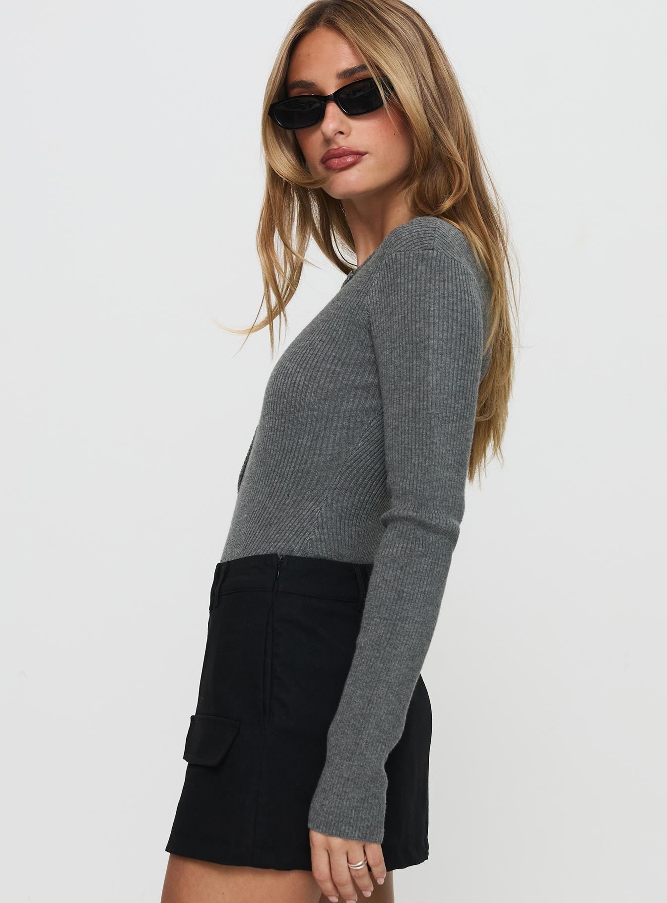 side view of model wearing Princess Polly Kerra Long Sleeve Bodysuit Charcoal Full Sleeves 