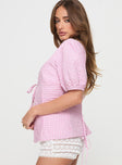 side view of model wearing Princess Polly Sez Top Pink Gingham Half Sleeves Plunger 