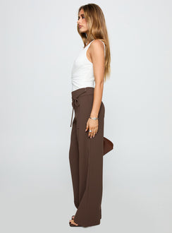 side view of model wearing Princess Polly Rush Hours Pants Chocolate High Waisted Pants 
