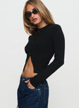 side view of model wearing Princess Polly Suzu Long Sleeve Top Black Full Sleeves High Neck 