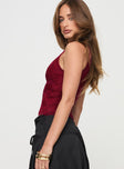 side view of model wearing Princess Polly Far Away Top Burgundy Sleeveless V-Neck 