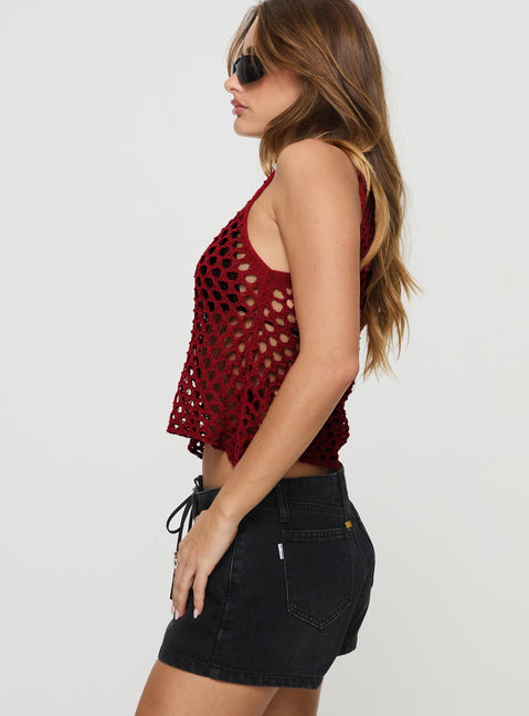 side view of model wearing Princess Polly Shikarni Knit Top Red Sleeveless Scoop Neck 
