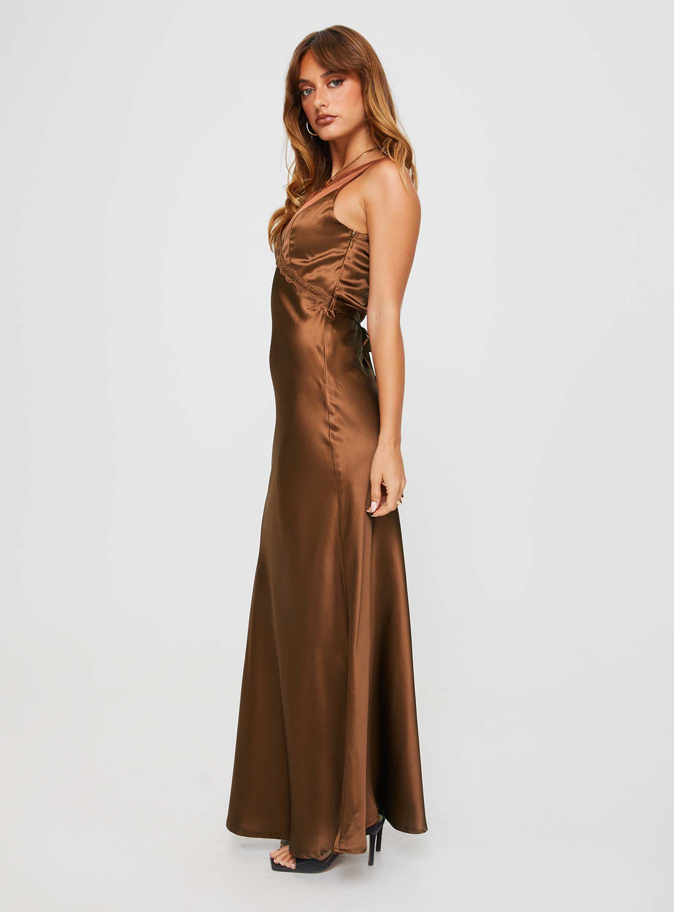 side view of model wearing Princess Polly Galloway Maxi Dress Brown Plunger 