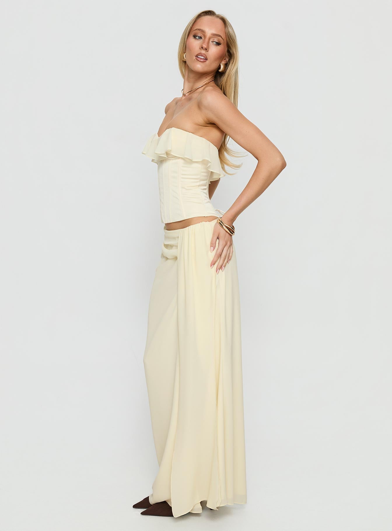   side view of model wearing Princess Polly Holliann Draped Maxi Skirt Butter Maxi Skirts 