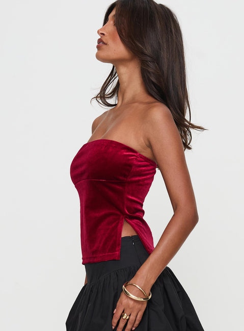 side view of model wearing Princess Polly Janece Strapless Velvet Top Red Sleeveless straight 