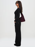 side view of model wearing Princess Polly Everlong Jean Mid Black Wash High Waisted 