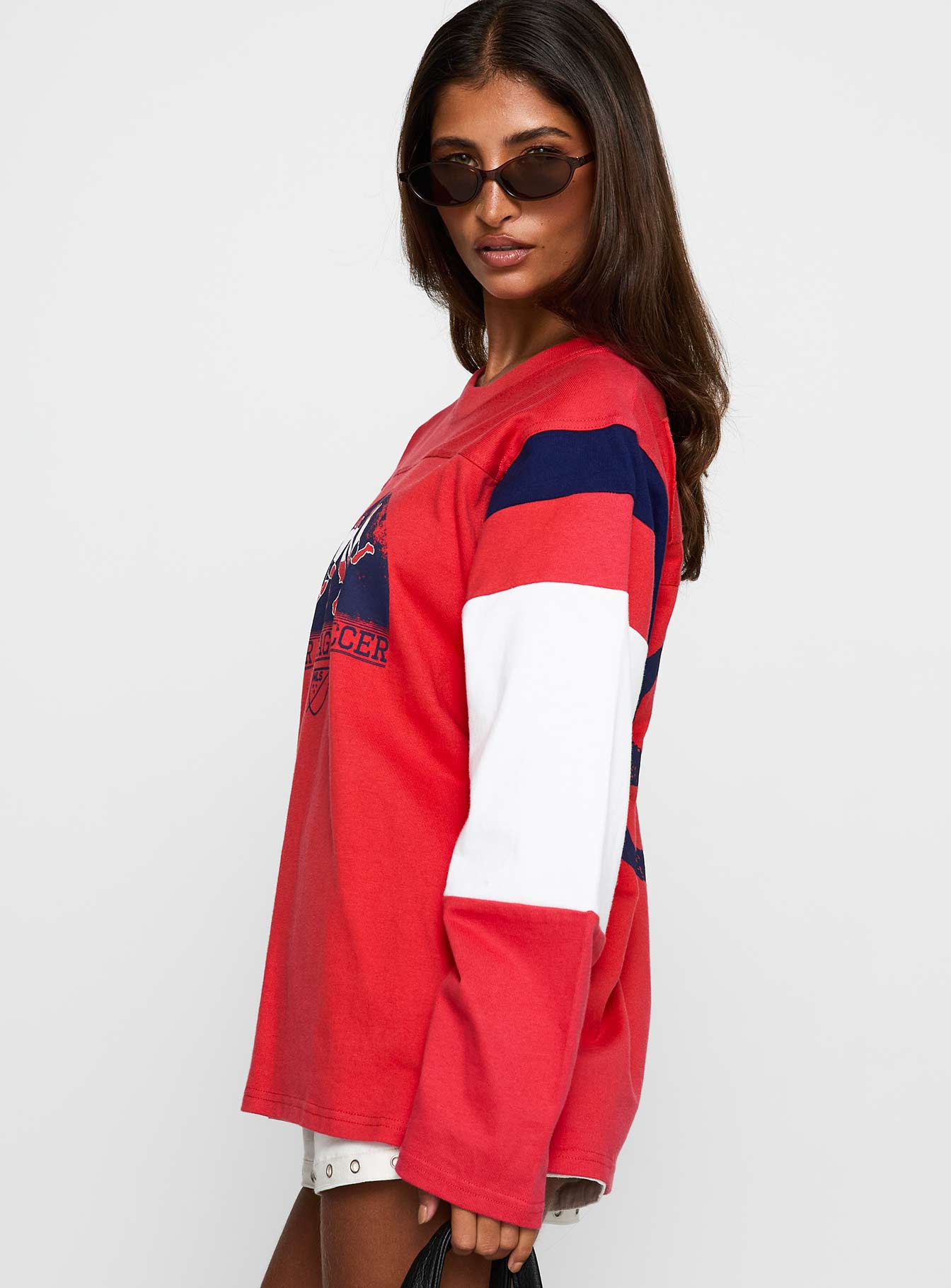 side view of model wearing Princess Polly MLS 96 Retro Long Sleeve Top Red Full Sleeves Crew Neck 