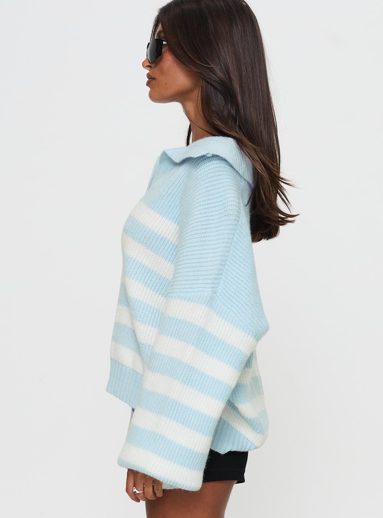 side view of model wearing Princess Polly Carolena Long Sleeve Collared Knit Sweater Blue / White Stripe Long 