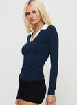 side view of model wearing Princess Polly Challenger Long Sleeve Top Navy Full Sleeves V-Neck 