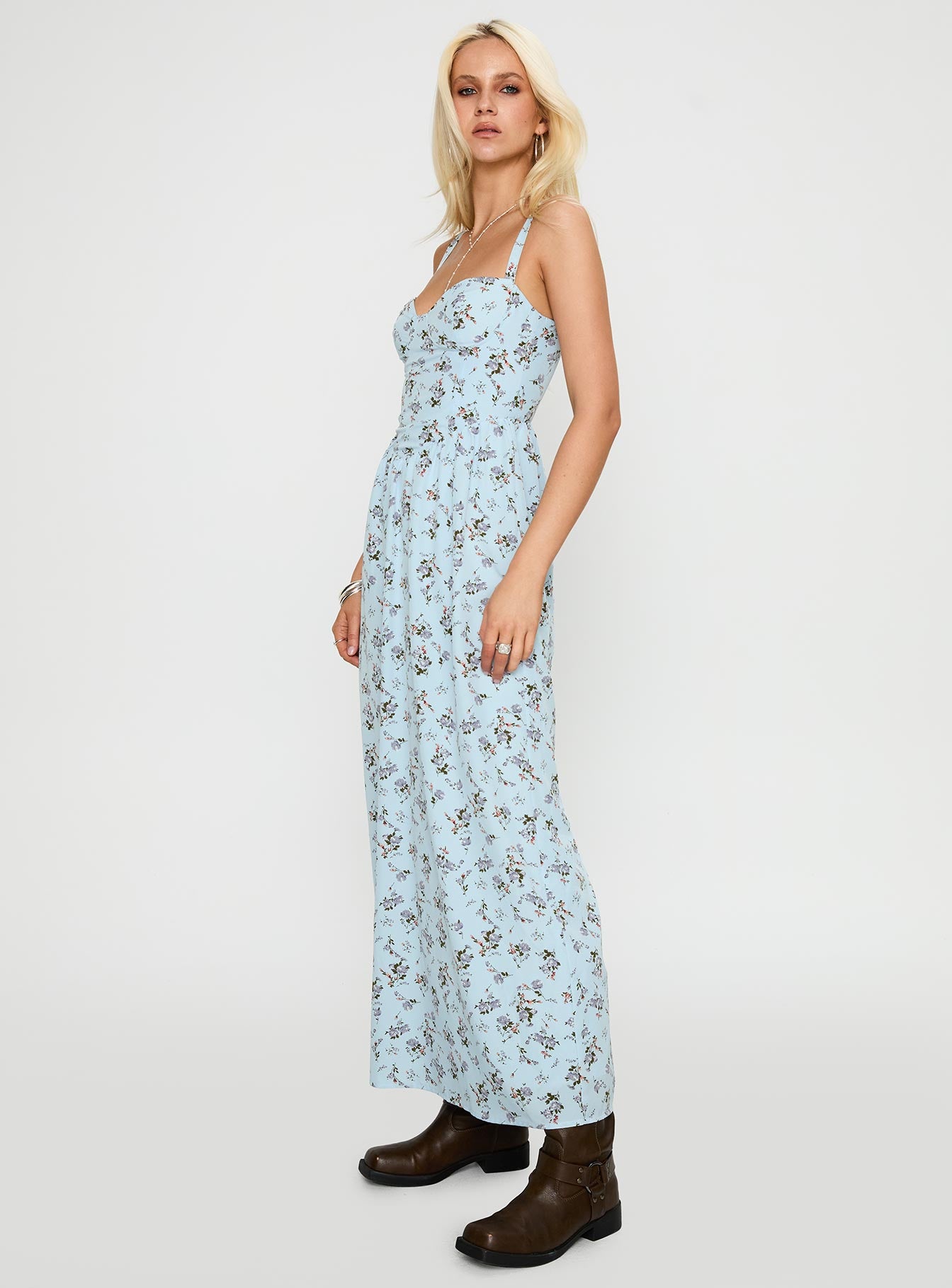 side view of model wearing Princess Polly Izebella Maxi Dress Blue Floral Sweetheart Neckline 