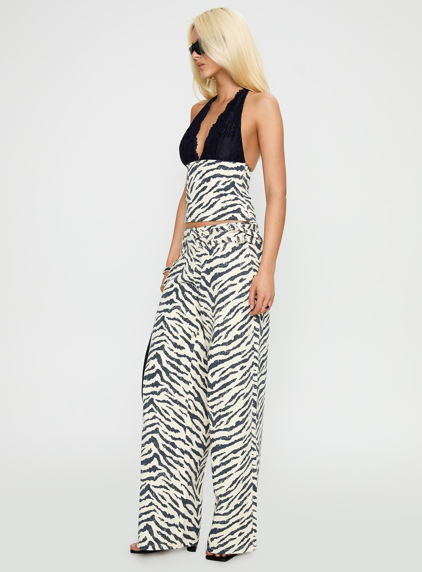 side view of model wearing Princess Polly Paltrow Cargo Pant Zebra High Waisted 