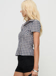 side view of model wearing Princess Polly Alma Mater Top Multi Check Short Sleeves High Neck 