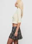 side view of model wearing Princess Polly Cannon Skort Multi Tall 