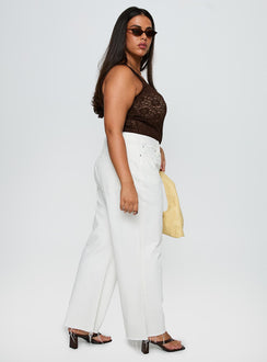 side view of model wearing Princess Polly Fawcett Jeans White Curve High Waisted 