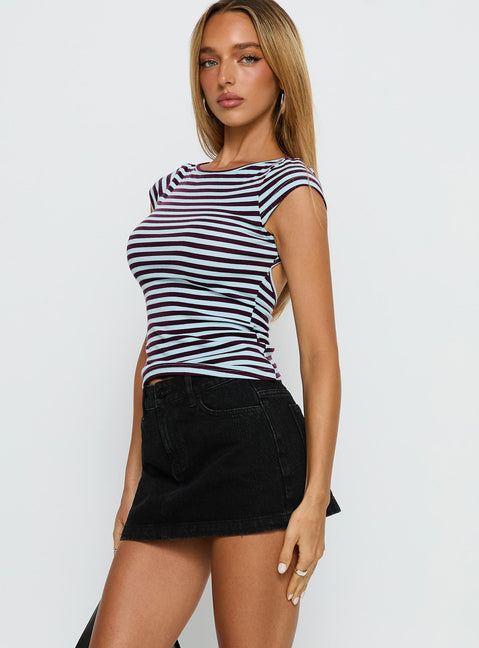   side view of model wearing Princess Polly Nicolina Low Rise Denim Mini Skirt Washed Black Mini Skirts 