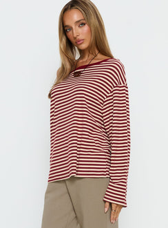 side view of model wearing Princess Polly Ralyssa Off Shoulder Long Sleeve Top Red Stripe Longline Jumpers 