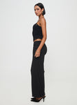   side view of model wearing Princess Polly Kalyn Ruched Front Maxi Skirt Black Maxi 