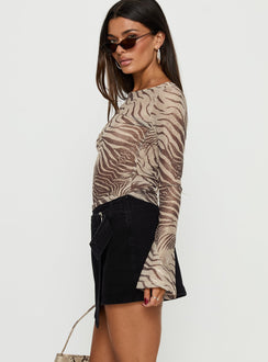   side view of model wearing Princess Polly Elinora Wrap Mini Skirt Washed Black Mini Skirts 