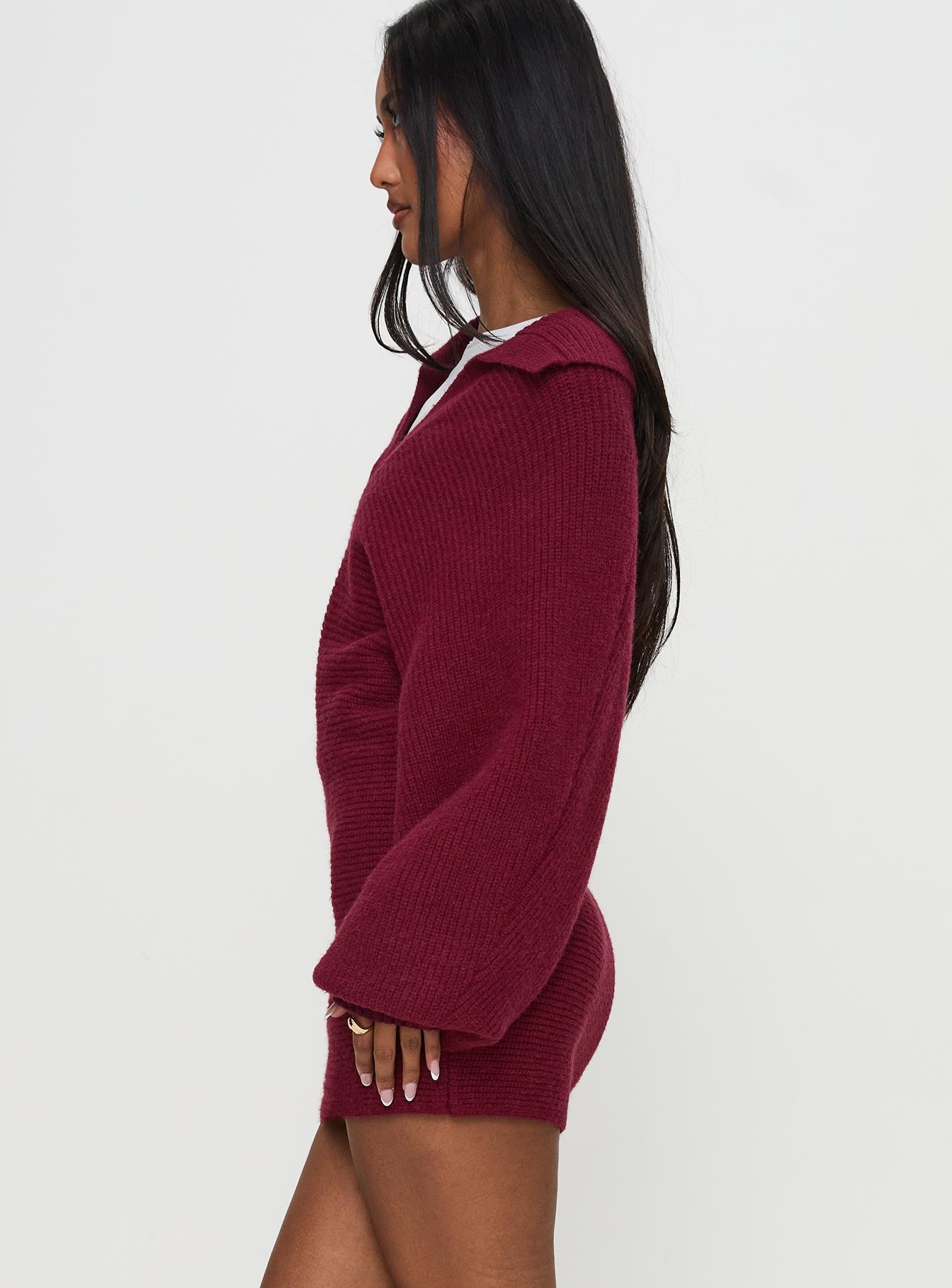 side view of model wearing Princess Polly Thorelle Sweater Mini Dress Burgundy V-Neck 