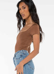 side view of model wearing Princess Polly Byer Bodysuit Brown Short Sleeves Square Neck 